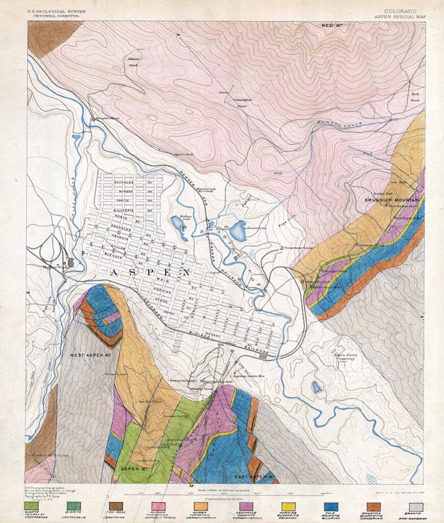 One 24" x 29" Geological Atlas. It was made to accompany a report on the Aspen Smelting Company in the Aspen Mining District, by R.T. Walker in October 1925. The atlas includes nine pages of maps, photos, and geological surveys. The first page has a map titled "Clason's Guide Map of the State of Colorado, which shows the entire state. The second page has a topographical map of the area around Aspen, with a mineralized zone highlighted in red. The third page has a map that shows a closer view of the area immediately surrounding Aspen, with different geological aspects highlighted in various colors. The fourth page has a map titled "Outline Map of Principal Mining Properties, Aspen Mining District". The fifth page has two b/w images; one look over Aspen towards Independence Pass, and the other shows Aspen from Smuggler Mountain, looking west. The sixth page has two identical photos of Smuggler Mountain; the top one has been shaded in various colors to show different geological formations. The seventh page does the same thing, but with images of Aspen Mountain. The eighth page has a map titled "Geological Sections, Aspen Mining District". The ninth page has a fold-out map titled "Longitudinal Section Along Ore Zone in Smuggler Mountain".